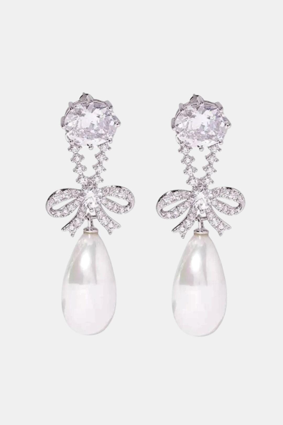 Lynell – Silver Bow Drop Pearl Earrings