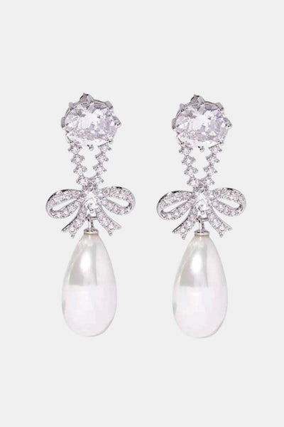 Lynell – Silver Bow Drop Pearl Earrings